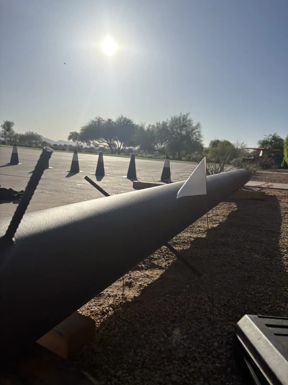 Apex crew installing a shade sail structure on site