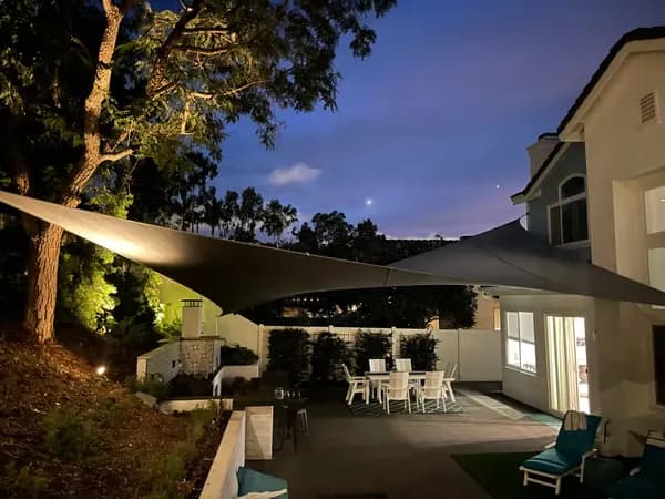 Tensioned shade sail over a Phoenix home