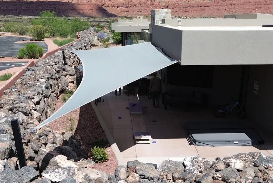 Aerial view of Phoenix commercial shade sail install with mountain backdrop